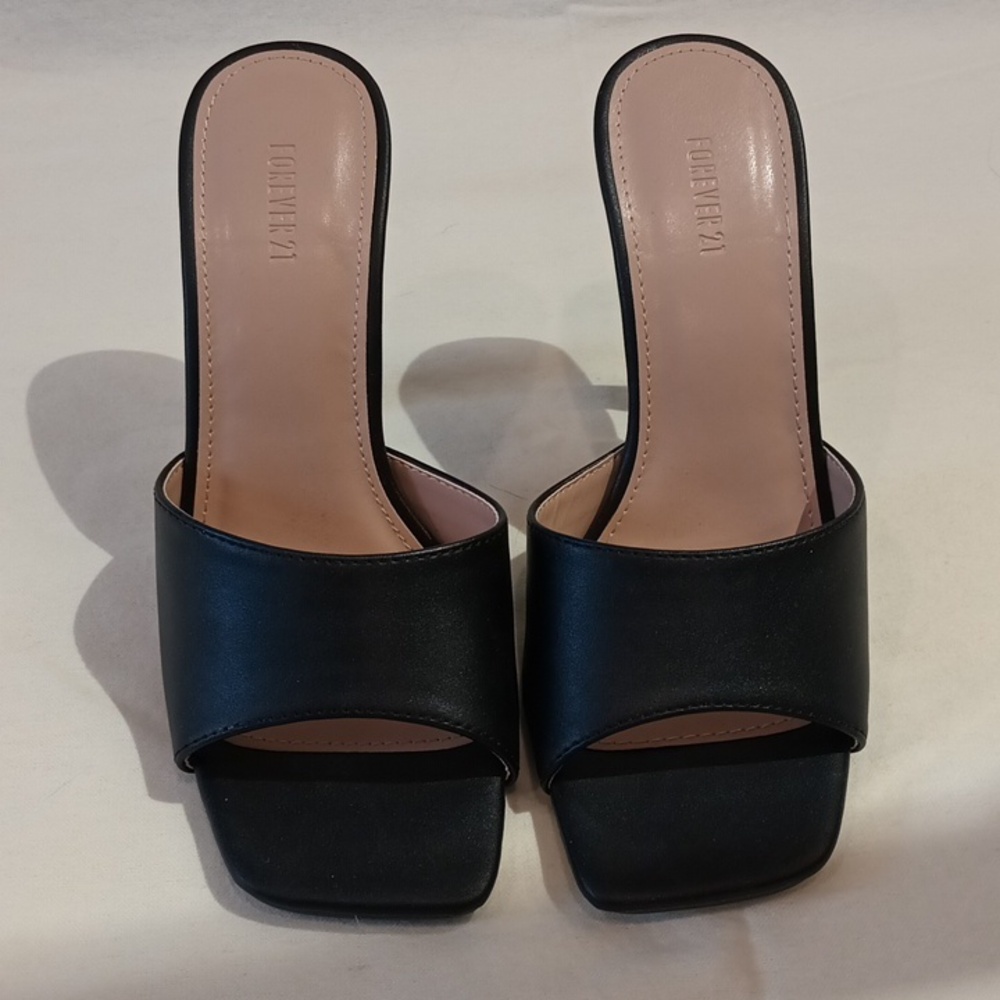 Black heeled mules